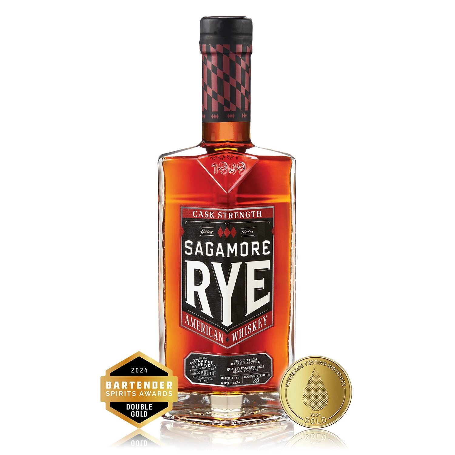 A bottle of Sagamore Spirit Cask Strength American Rye Whiskey stands upright, its label reading "cask strength," with two gold medals—2024 Bartender Spirits Awards and a spirits competition—signifying this premium rye whiskey’s excellence.