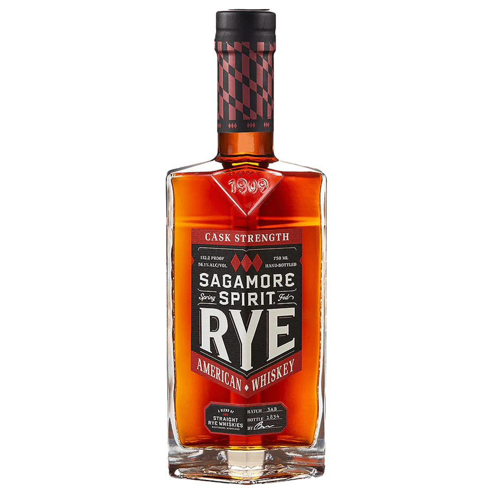 A bottle of Sagamore Spirit Cask Strength American Rye Whiskey, with a red and black label marked “Cask Strength” and “RYE,” plus a geometric patterned cap—showcasing this premium rye whiskey.