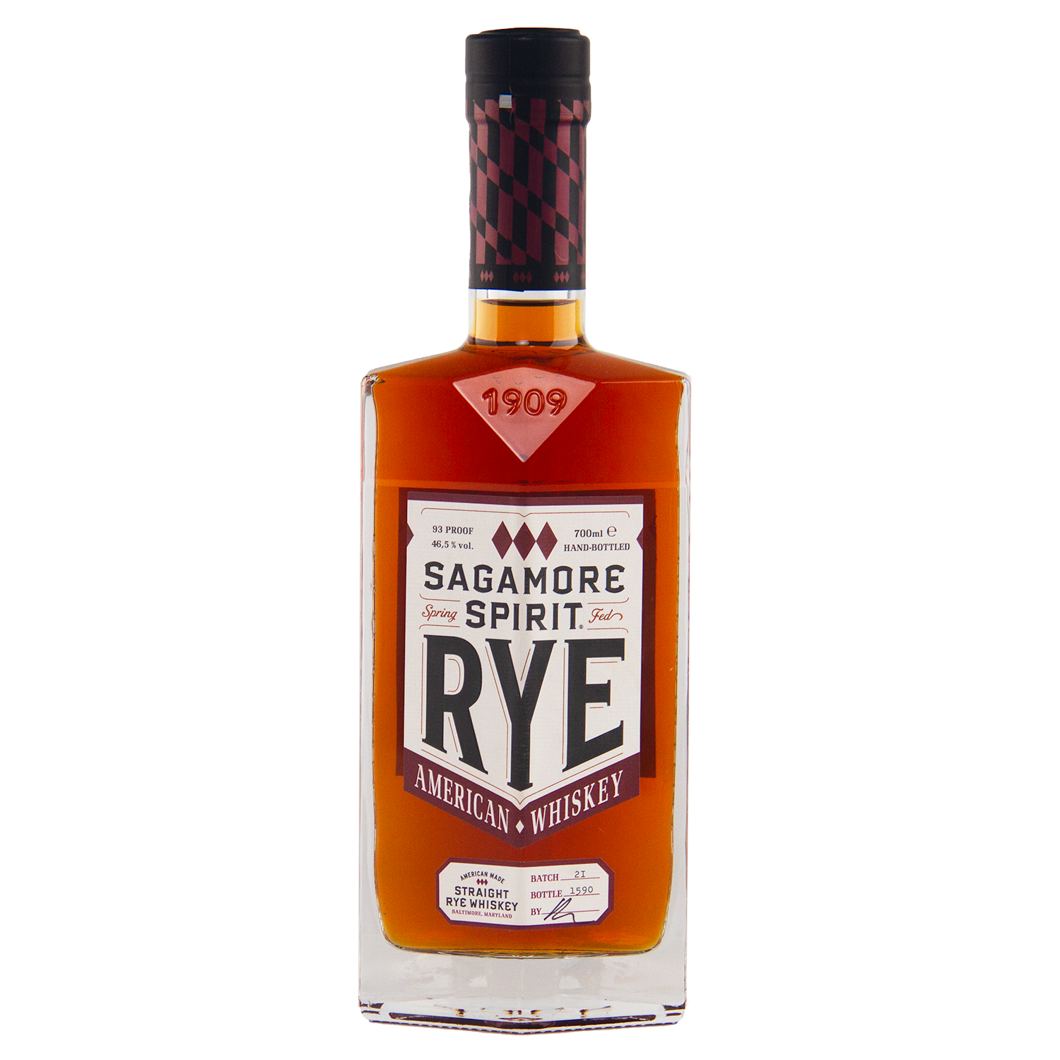 A bottle of Sagamore Small Batch Straight Rye American Whiskey features amber liquid, a maroon and black-checkered cap, and a white label displaying the brand name and whiskey details.