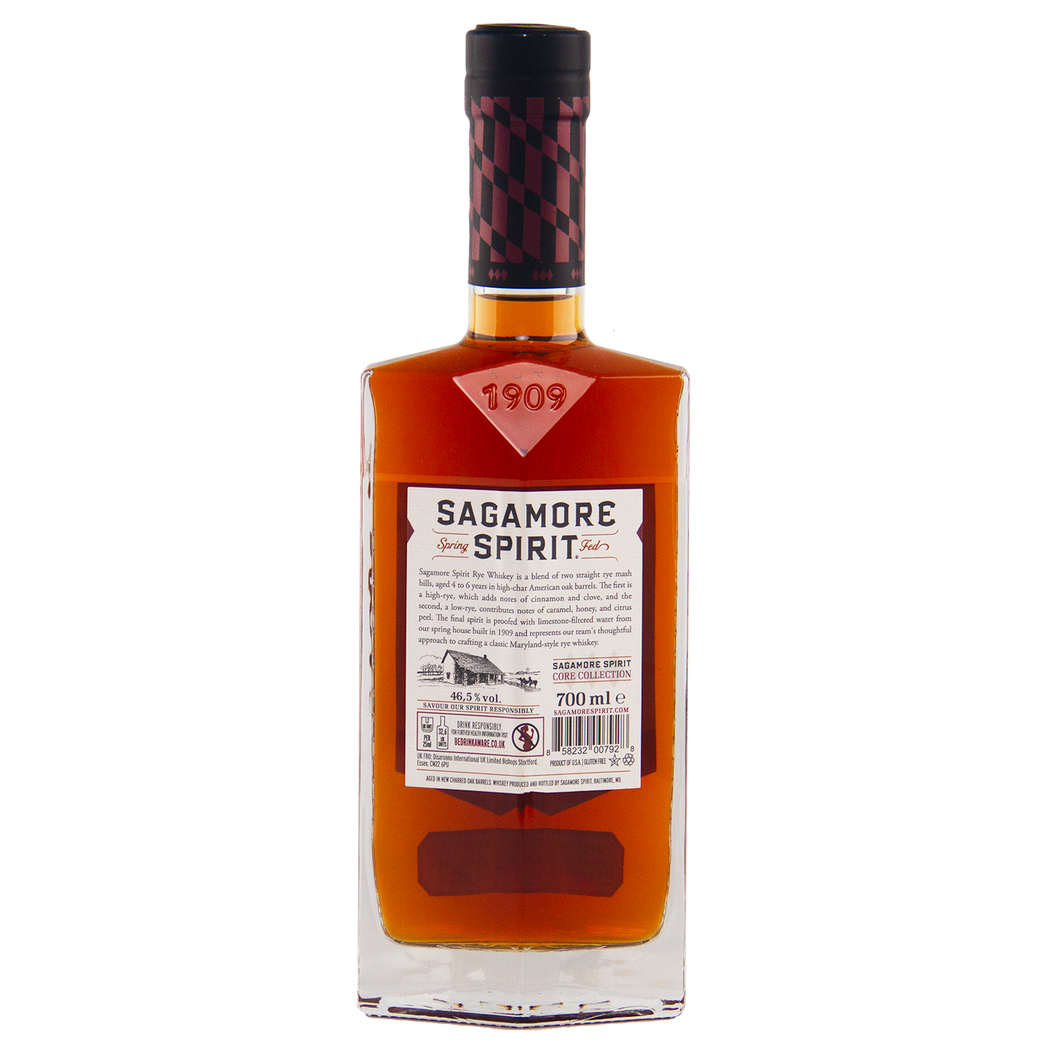 A rectangular bottle of Sagamore Small Batch Straight Rye American Whiskey with amber liquid, a black and red cap, and a front label featuring the brand name, product details, and a horse-drawn plow illustration—a true Maryland rye.