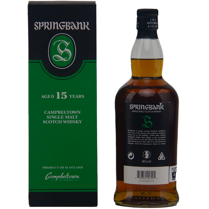 A bottle of Springbank 15 Year Old Single Malt Whisky stands beside its green and black box, both featuring the brand name and highlighting its ex-Sherry cask maturation.
