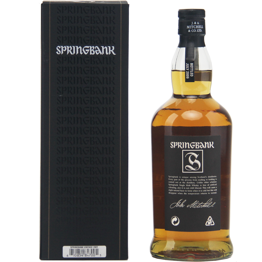 A bottle of Springbank Vintage 2001 Single Malt Scotch Whisky with a black cap stands next to its black box packaging, both displaying the Springbank logo and white branding. The bottle holds cask strength, amber-colored whisky.