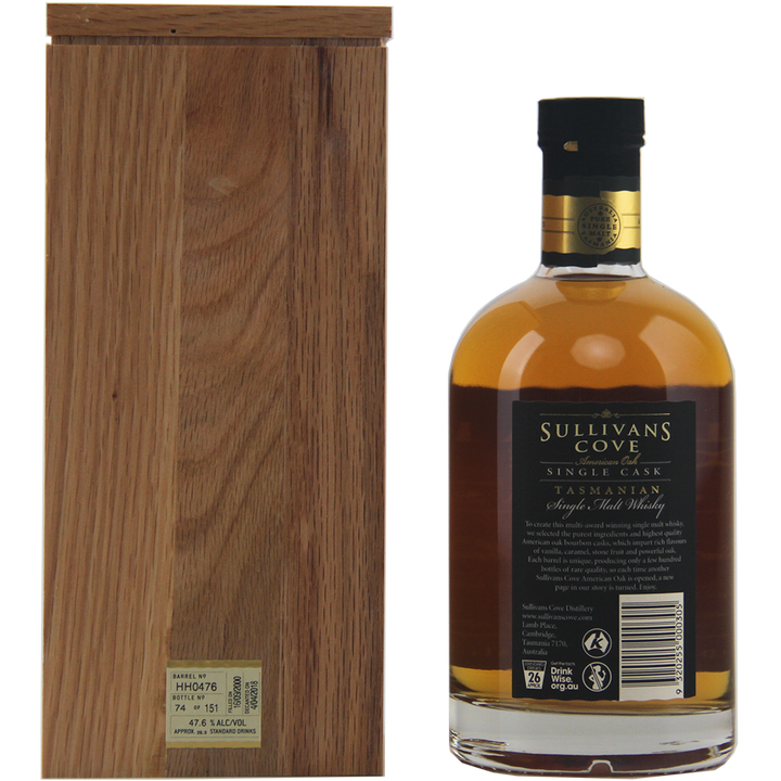 A wooden box stands next to a bottle of Sullivans Cove 17 Year Old Cask HH0476, matured in an American oak ex-bourbon cask, displaying the back label with product details and a gold foil seal on the cap.