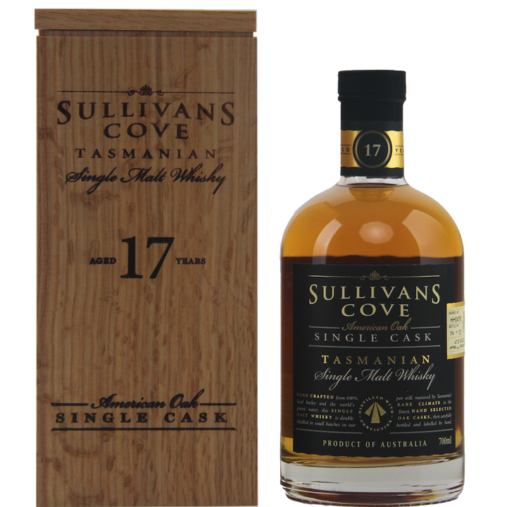 A bottle of Sullivans Cove 17 Year Old Cask HH0476 whisky, matured in American oak ex-bourbon, stands by its wooden box; both display elegant black and gold labels.