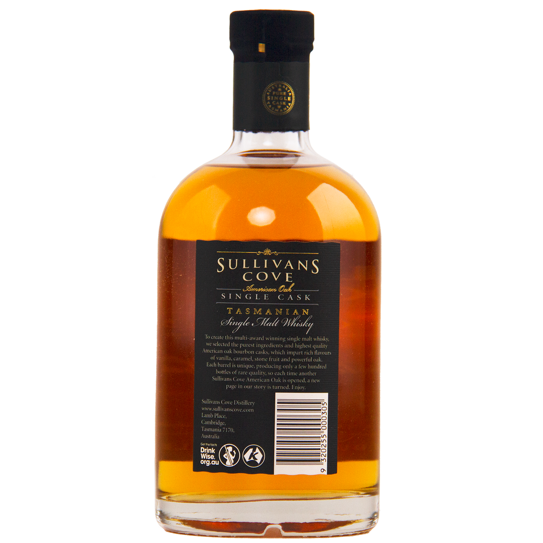 A 700ml bottle of Sullivans Cove American Oak Ex-Bourbon Single Cask TD0353, filled with amber whisky and sealed with a black cap, highlights its ex-bourbon heritage. The back label displays product details and a barcode.