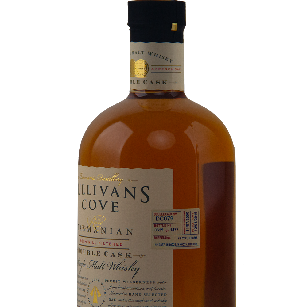 A close-up of a brown bottle of Sullivans Cove Double Cask DC079 Single Malt Whisky, showing the label and neck tag, with details about its maturation in French and American oak casks and specific batch information.