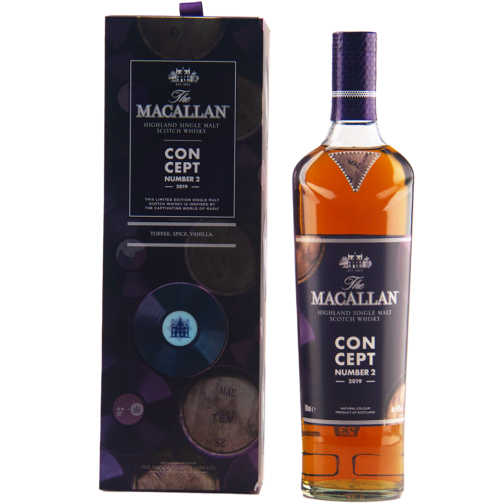 A bottle of The Macallan Concept Number 2 Single Malt Scotch Whisky stands beside its purple and gold box with barrel motifs. The label notes toffee, spice, and vanilla flavors.