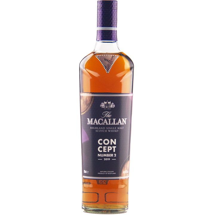 A bottle of The Macallan Concept Number 2 Single Malt Scotch Whisky, the limited 2019 edition, displays a striking purple and gold label on a plain white background.