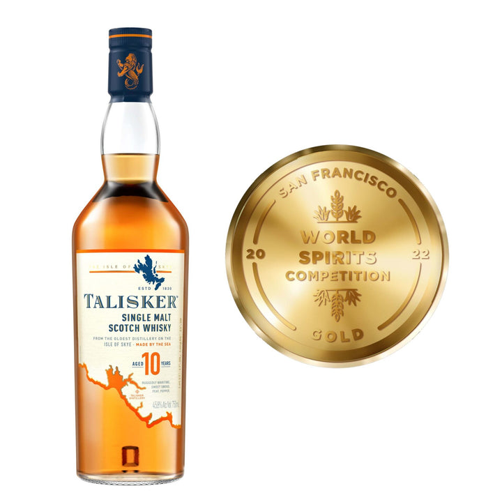 A bottle of Talisker 10 Year Old Single Malt Scotch Whisky stands beside a gold medal labeled San Francisco World Spirits Competition 2022 Gold.
