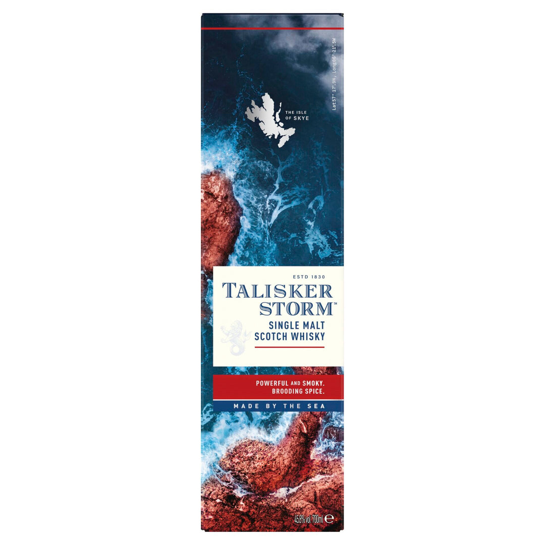 A box of Talisker Storm Single Malt Scotch Whisky shows stormy blue waves hitting a rugged red shore, highlighting this bold, smoky whisky that is "Made by the Sea.