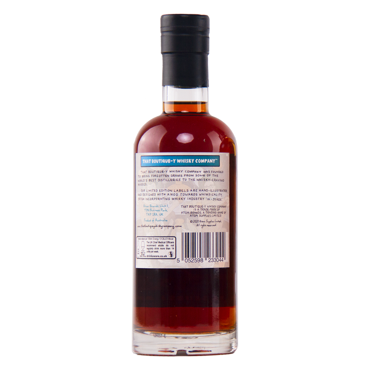 Bottle of whiskey with a label on a white background