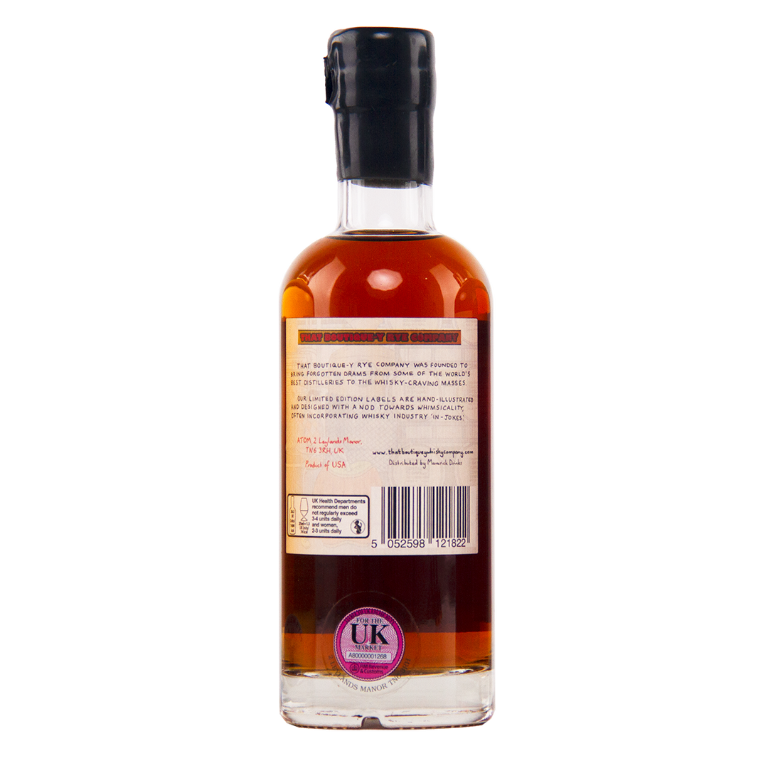 Bottle of whisky with a label on a white background