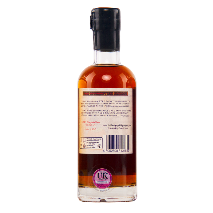 Bottle of whisky with a label on a white background