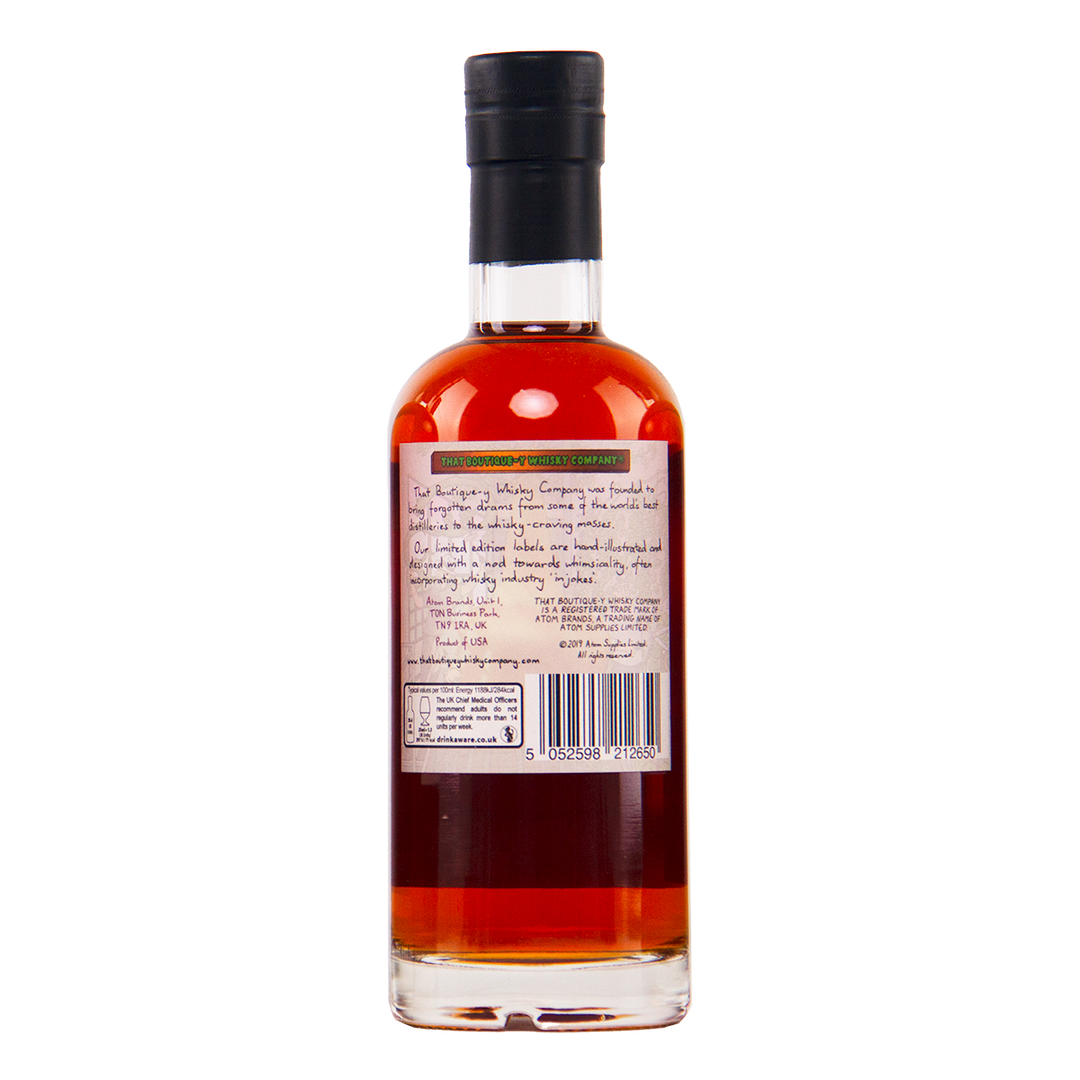 Bottle of alcohol with a label on a white background