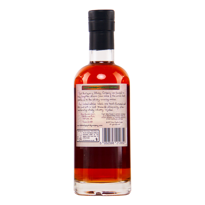 Bottle of alcohol with a label on a white background