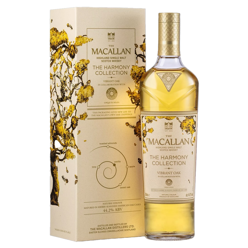 A bottle of The Macallan Harmony Collection Vibrant Oak Single Malt Scotch Whisky stands next to its cream and gold box decorated with tree branches, emphasizing oak sherry cask maturation on the label.