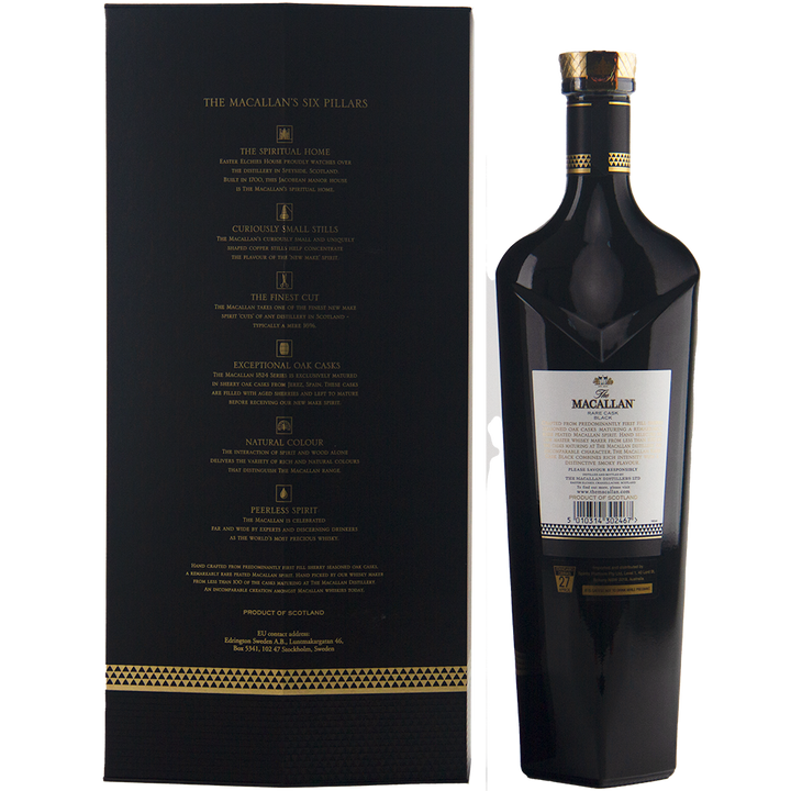 A dark bottle of The Macallan Rare Cask Black Single Malt Scotch Whisky stands beside its tall, black box adorned with gold text highlighting “The Macallan Six Pillars” and gold accents; the bottle is topped with a gold foil seal.