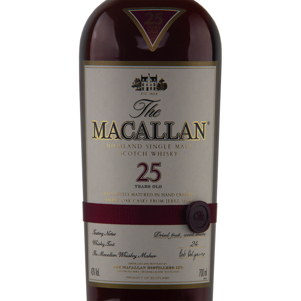 Close-up of The Macallan 25 Year Old Sherry Oak Single Malt Scotch Whisky (Pre-2018) bottle, showcasing its maroon and gold label with age, sherry oak cask maturation, and detailed whisky info on the front.
