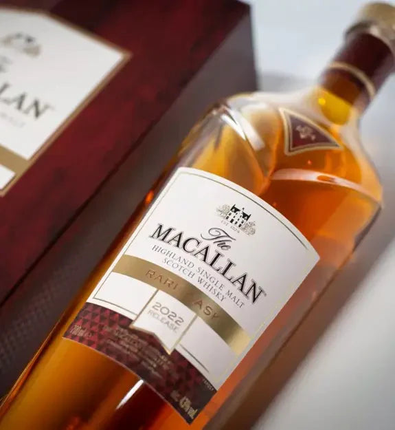 Bottle of The Macallan whisky with a wooden box in the background