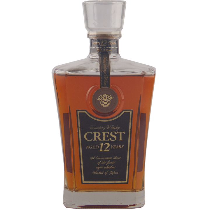Bottle of Crest Aged 12 Years whiskey on a white background