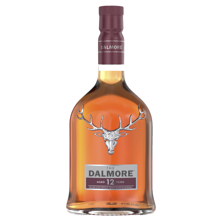 A bottle of The Dalmore 12 Year Old Single Malt Scotch Whisky, with a silver stag logo and maroon cap, filled with amber sherry cask whisky, is displayed against a plain white background.