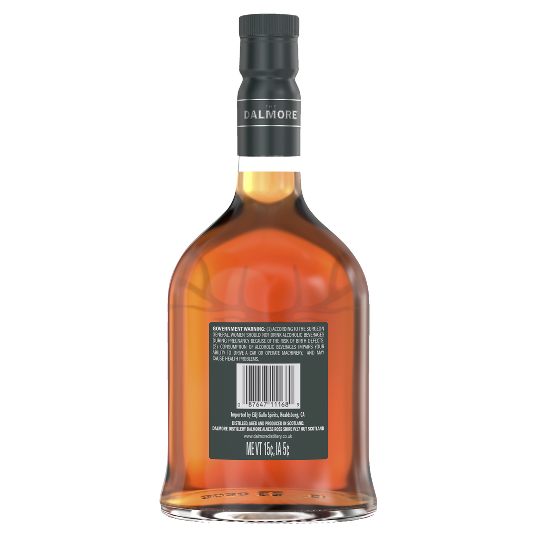A back view of The Dalmore 15 Year Old 2007 Vintage Single Malt Scotch Whisky shows its barcode, government warning label, and product details. The bottle has a black cap and contains amber-colored vintage whisky.