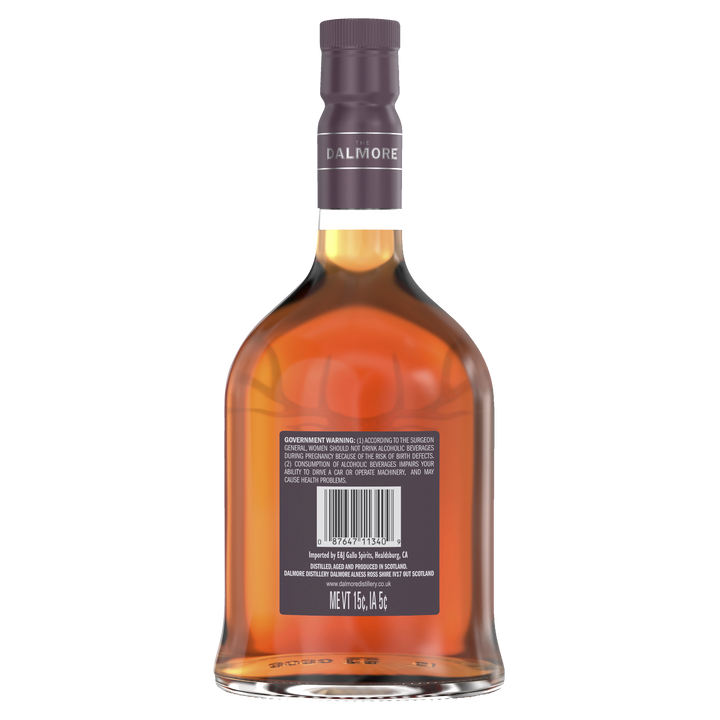 A bottle of The Dalmore Port Wood Reserve Single Malt Scotch Whisky seen from the back, displaying the barcode, government warning label, and amber liquid. The bottle features a purple cap and has a rounded, elegant shape.