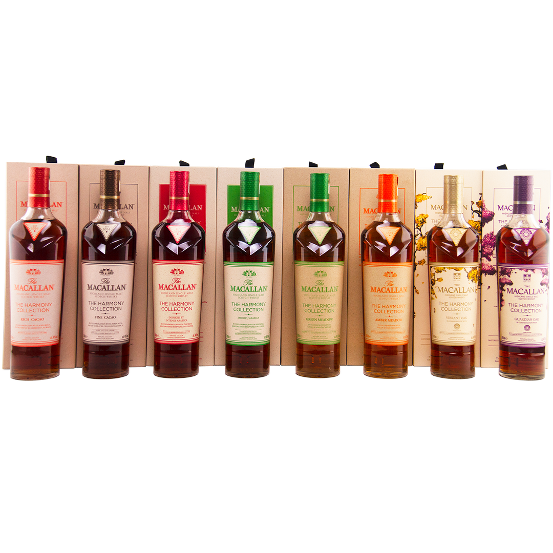 Collection of Macallan bottles displayed against a white background