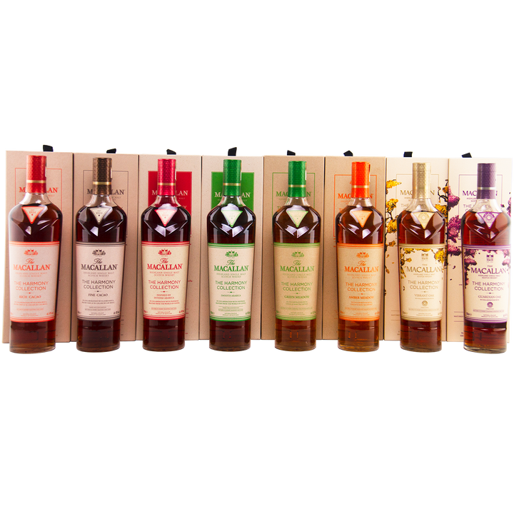 Collection of Macallan bottles displayed against a white background