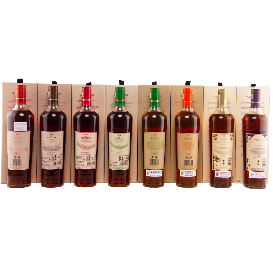 Set of wine bottles with labels on a wooden rack