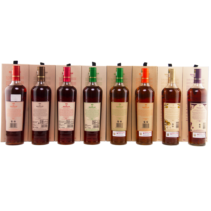 Set of wine bottles with labels on a wooden rack
