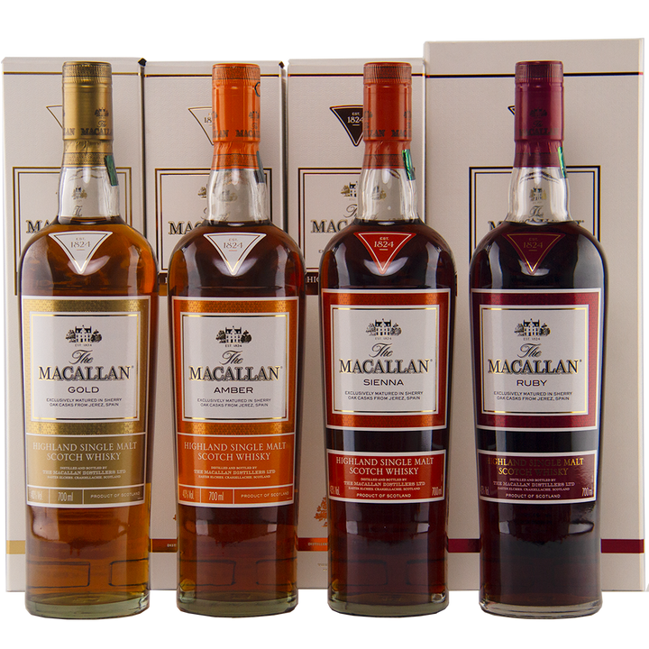 The Macallan 1824 Complete Series (4 Bottles) features Gold, Amber, Sienna, and Ruby single malts in front of their collectible boxes with gold and red accents; each whisky is matured in sherry wood.