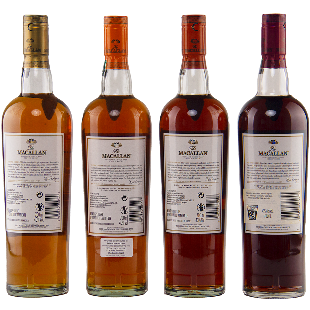 The Macallan 1824 Complete Series (4 Bottles) showcases the rear labels and whisky colors—from light amber to deep reddish-brown—of these collectible sherry wood matured whiskies.