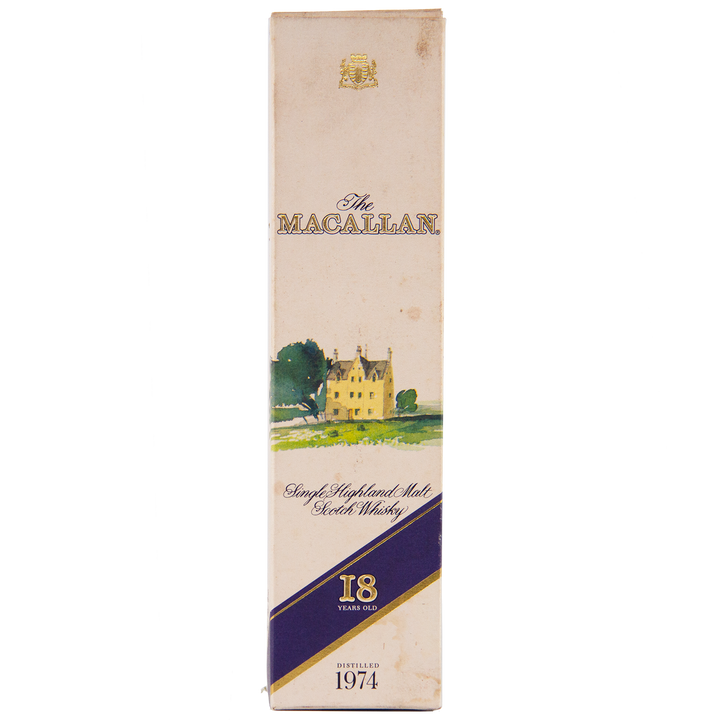 A cream-colored box of The Macallan 1974 18 Year Old Sherry Single Malt Scotch Whisky, with a gold crest, house and tree illustration, labeled "18 Years Old" and "Distilled 1974"—a highly collectible sherry oak-matured Scotch.