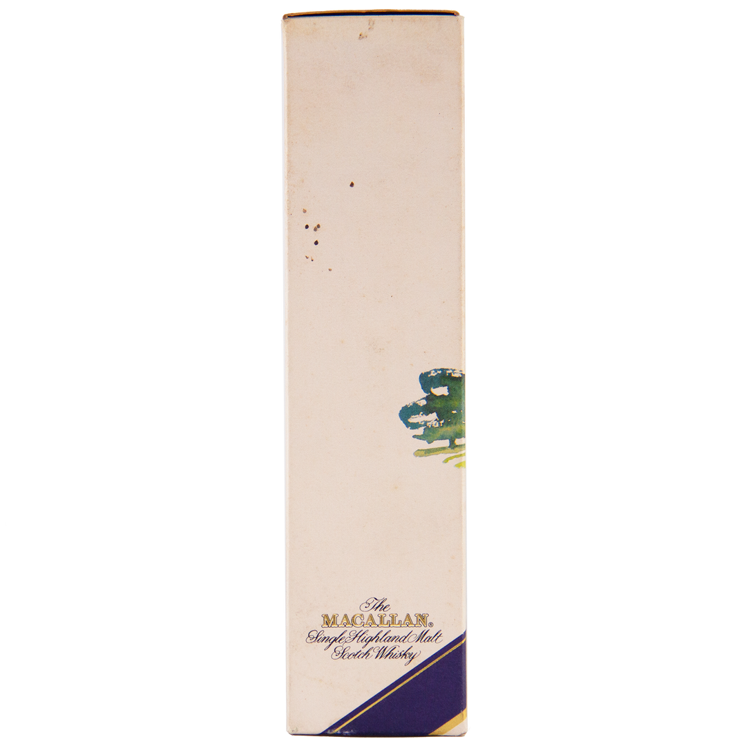 A mostly white rectangular box, featuring "The Macallan 1974 18 Year Old Sherry Single Malt Scotch Whisky" near the bottom, with navy and gold diagonal accents plus a small green-blue abstract—ideal for collectors of fine Scotch whisky.