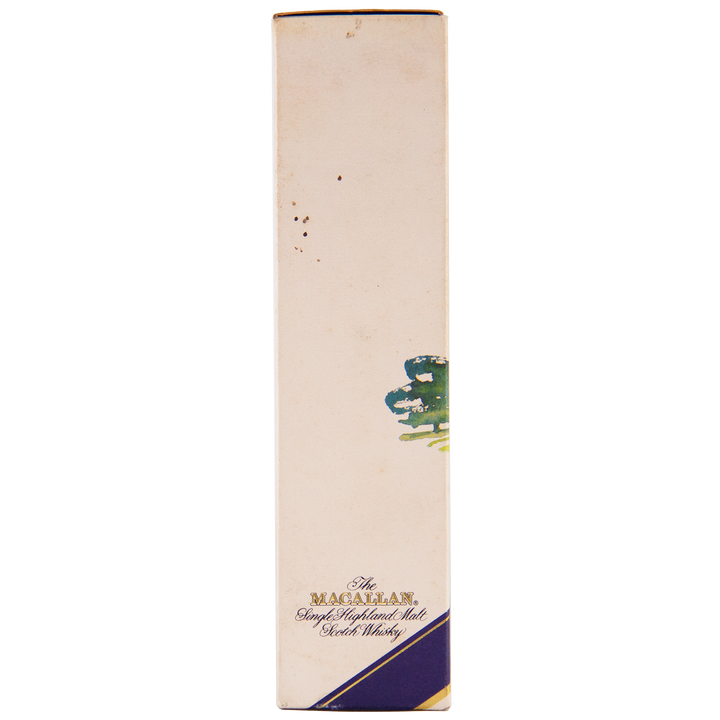 A mostly white rectangular box, featuring "The Macallan 1974 18 Year Old Sherry Single Malt Scotch Whisky" near the bottom, with navy and gold diagonal accents plus a small green-blue abstract—ideal for collectors of fine Scotch whisky.