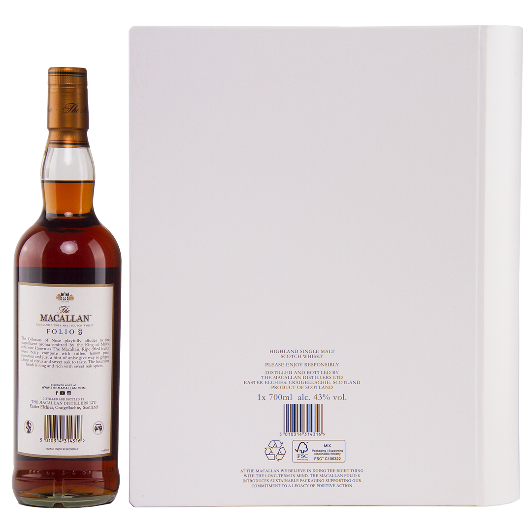 A bottle of The Macallan Archival Series Folio #8 Single Malt Whisky stands by a large white box. This limited-edition release features amber liquid and a white label with gold and black accents.
