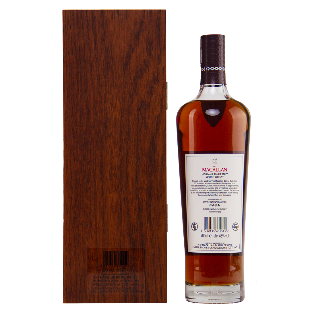 A bottle from The Macallan Colour Collection Set is displayed from the back beside a tall wooden box on a white background. The bottle has a brown cap, cream label with red text, and highlights sherry-seasoned oak maturation.