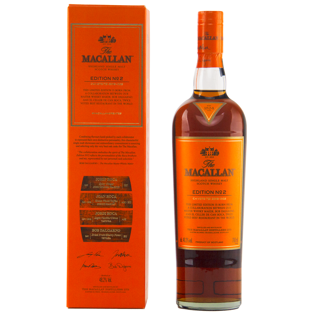 A bottle of The Macallan Edition 2 Single Malt Whisky stands beside its matching orange box, both adorned with gold and black labels featuring detailed text and signatures from the iconic Edition Series.