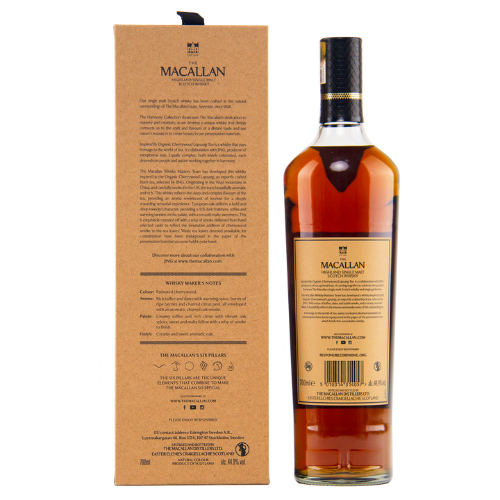 A bottle of The Macallan Harmony Collection Jing Single Malt Scotch Whisky stands next to its brown box, both featuring brand and product details in black and gold text, highlighting this travel retail exclusive on a white background.