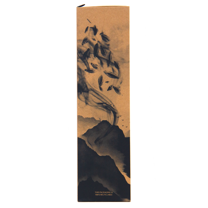 A tall, rectangular, brown box featuring a black ink-style illustration of mountains and swirling leaves. The text at the bottom reads: THIS PACKAGING IS 100% RECYCLABLE. The Macallan Harmony Collection Jing Single Malt Scotch Whisky.