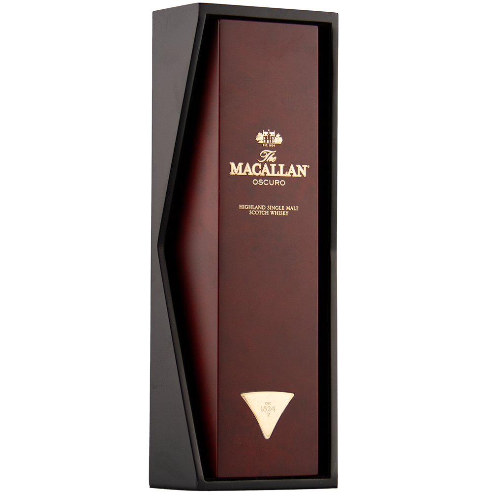 A rectangular box of The Macallan Oscuro Single Malt Scotch Whisky showcases a dark angular frame and gold lettering on a rich red-brown background, reflecting its maturation in sherry-seasoned oak casks.