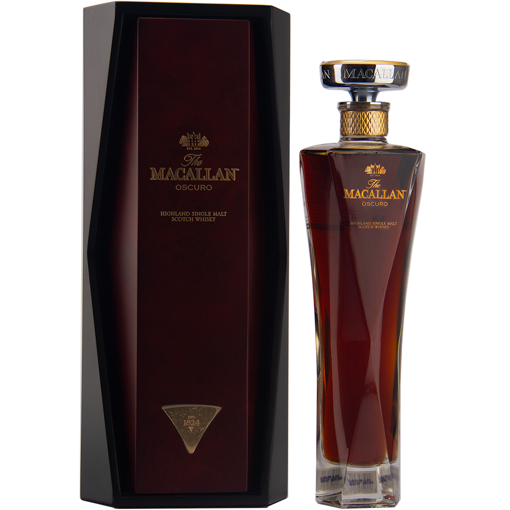 A tall, elegant bottle of The Macallan Oscuro Single Malt Scotch Whisky stands beside its matching dark, angular box with gold lettering and accents.