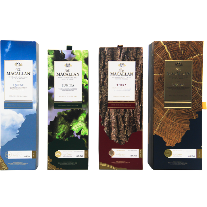 Four boxes of The Macallan Quest Complete Series are displayed side by side, each with unique designs—blue sky, green leaves, tree bark, and tree rings—symbolizing whisky maturation and ideal for travel retail shelves.
