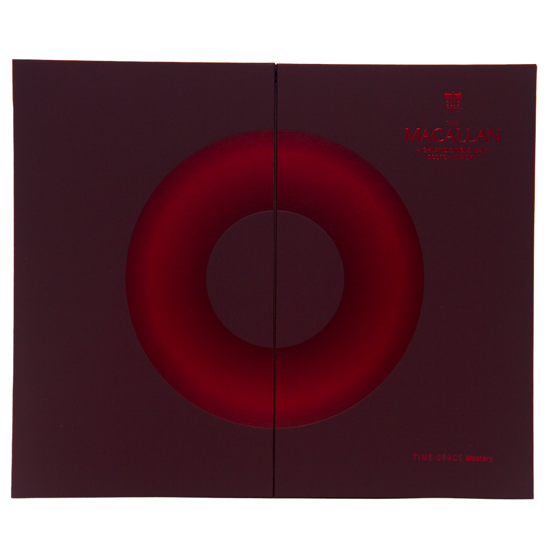 A dark red and burgundy box with a circular red gradient design, The Macallan branding in the upper right, and "Macallan Time Space Mastery" at the bottom right celebrates The Macallan Time Space Mastery Single Malt Scotch Whisky's 200th Anniversary—a true collectible.