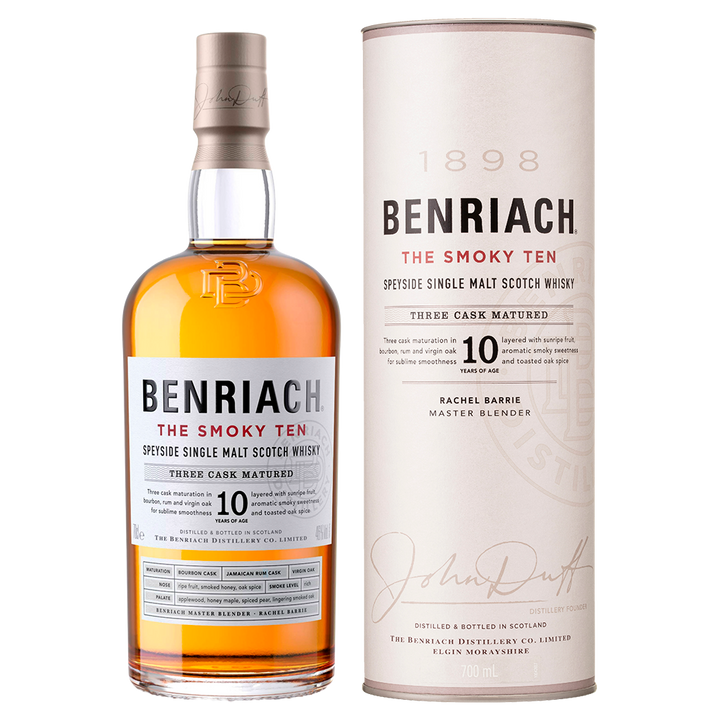 A bottle of Benriach The Smoky Ten Single Malt Scotch Whisky, aged 10 years, stands next to its cylindrical box. Both feature the brand name, product details, and gold, white, and dark gray accents.