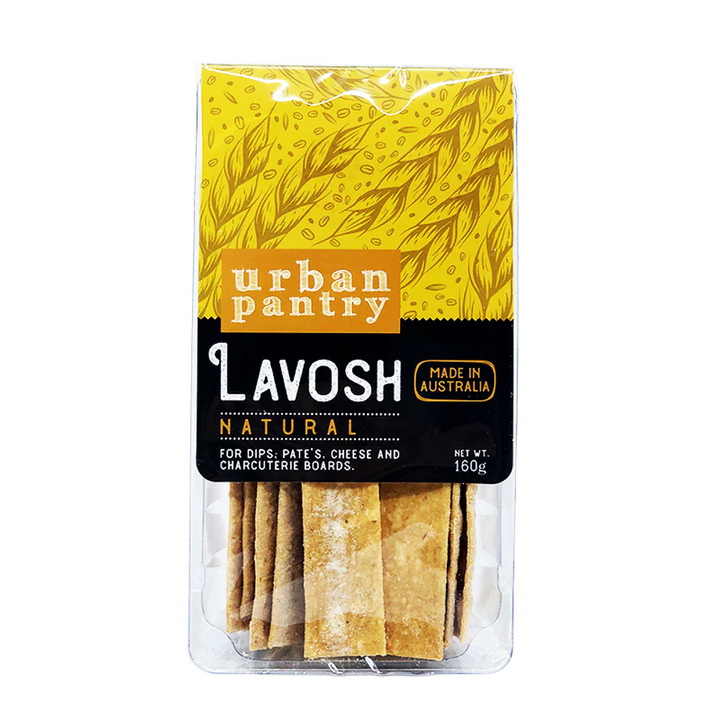A 160g pack of Urban Pantry Natural Lavosh, an Australian-made flatbread in yellow and black packaging with wheat graphics and a clear window displaying rectangular crackers—ideal for cheese, dips, and grazing boards.