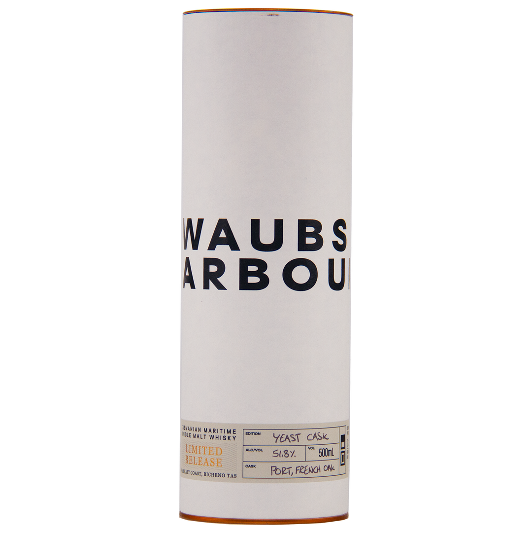 A cylindrical white container with bold WAUBS HARBOUR lettering and a beige label at the base details this limited-edition Waubs Harbour Yeast Cask Single Malt Australian Whisky, 51.6% ABV, 500ml.