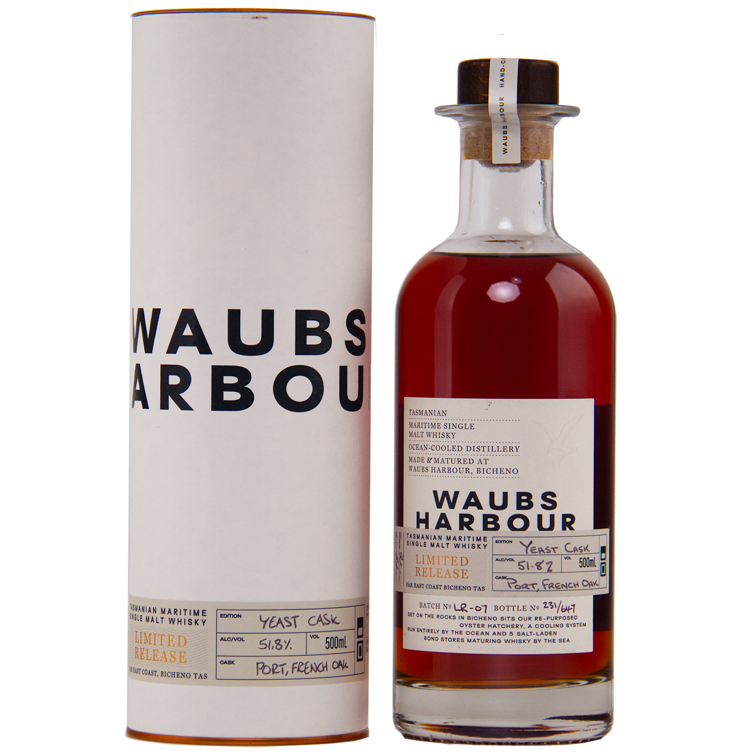 A bottle of Waubs Harbour Yeast Cask Single Malt Australian Whisky stands beside its white cylindrical case. The label notes Limited Release and Port, French Oak casks, highlighting this rich amber, limited-edition Australian whisky.