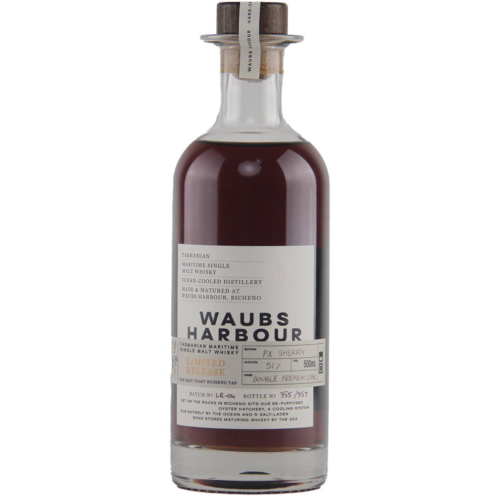 A bottle of Waubs Harbour PX Sherry Cask Single Malt Australian Whisky featuring dark brown liquid, a clear label with batch and bottle numbers, wooden cork stopper, and matured in PX Sherry and French oak casks.